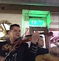 image of Solo Violinist Alfonso with Alma Latina performing at restaurant 