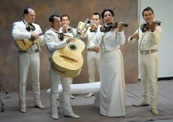 image of Mariachi Grullense rehearsing at MCCS photo shot in white charro attire