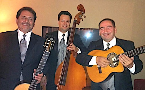 image of Trio America members: Pedro - Juan - Rigoberto (suited up at wedding reception gig)